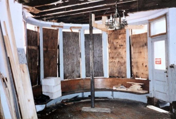 Image 17 - (BEFORE) The round room was gutted and floors levelled. The door and stairway to the side entry was removed.
