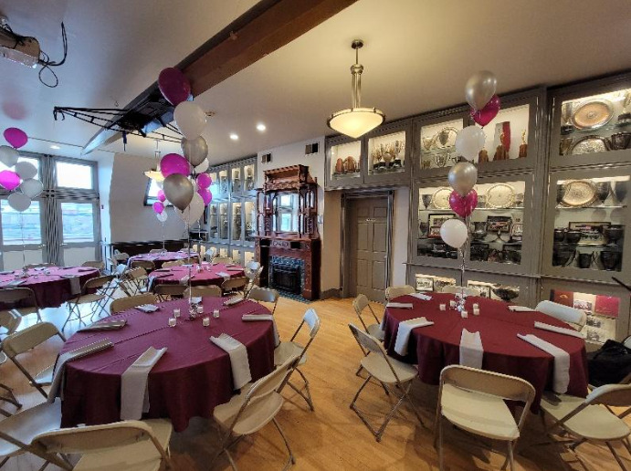 Image 16 - (AFTER) Formerly two rooms with a dividing wall – now doubles as a workout space and social space